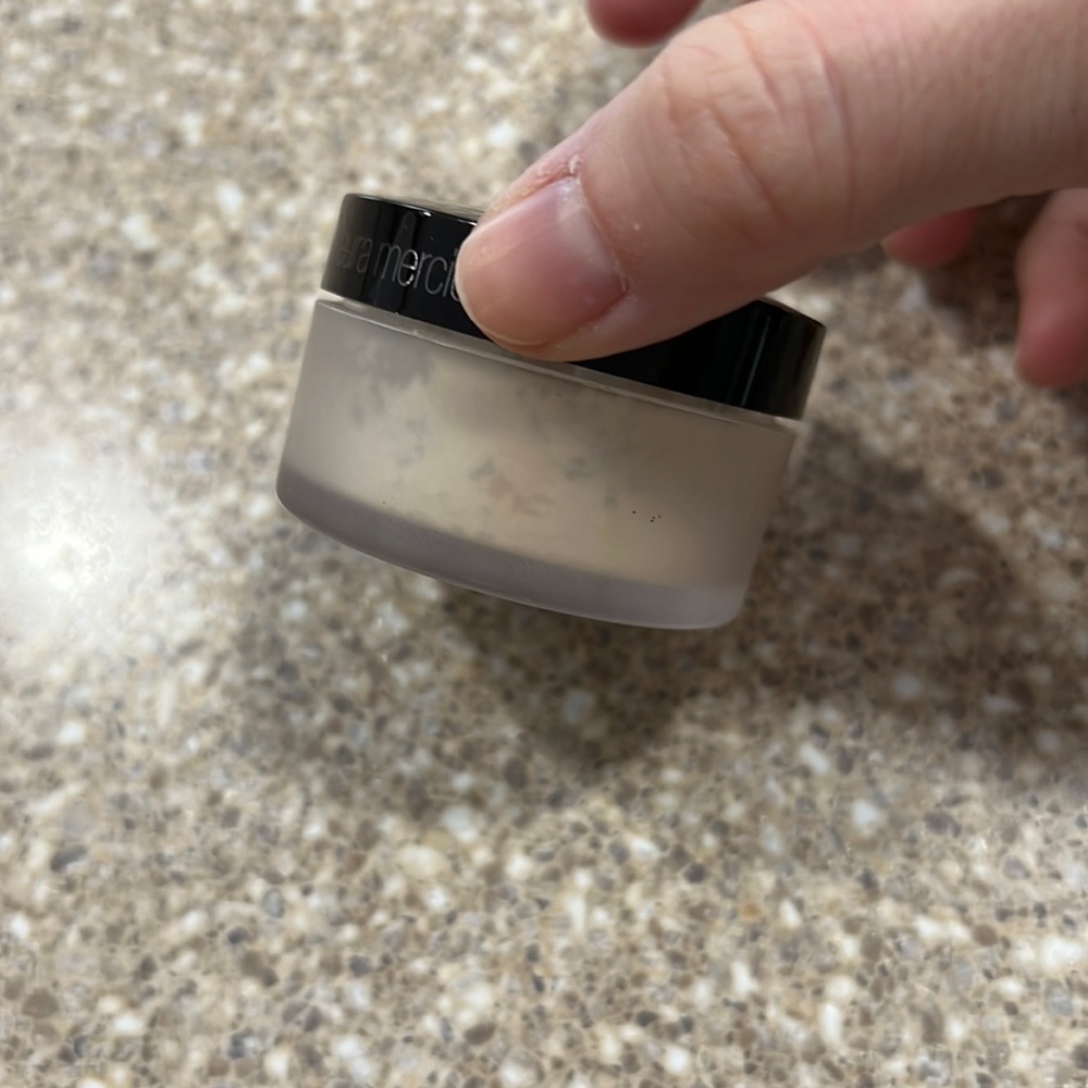 Laura Mercier translucent setting powder. Hardly used!